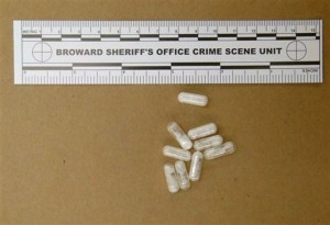 This Feb. 12, 2015 photo made available by the Broward Sheriff's Office, Fla.,  shows confiscated vials of flakka. This emerging drug can alter brain chemistry in such a way that users can't control their thoughts and it can increase adrenalin. (AP Photo/Broward  Sheriff's Office via AP)